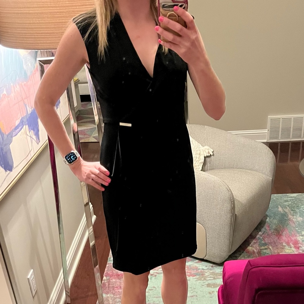 Gorgeous black dress from White House Black Market. Work once!